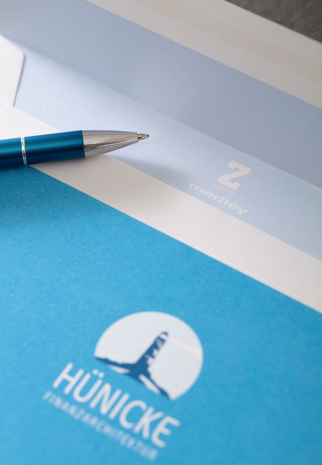 huenicke finanzarchitektur briefpapier